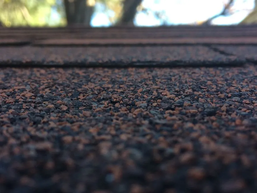 Close-up texture of a granulated bitumen felt roof covering