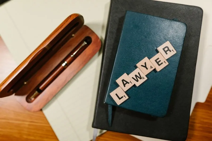 Notepad and pen on a desk used for recording contract details