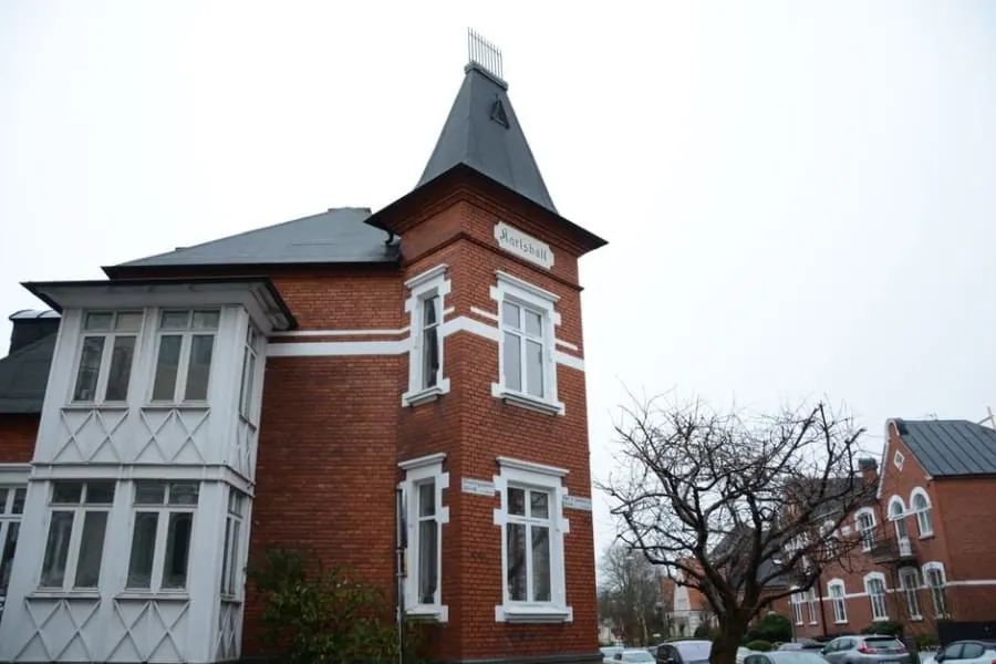 The steep pitched roofline of a Victorian house with generous loft space