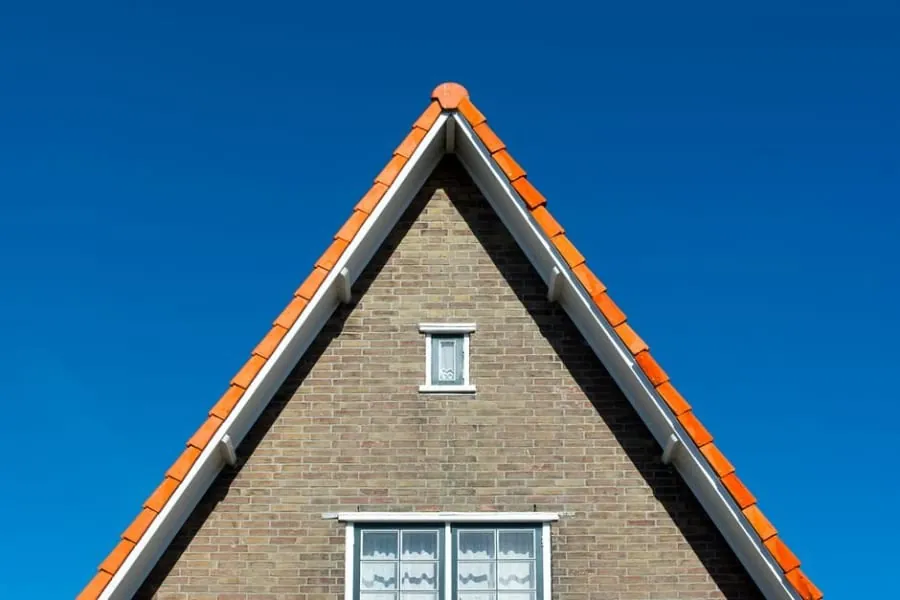 Dry verge units capping the tile ends at a gable edge