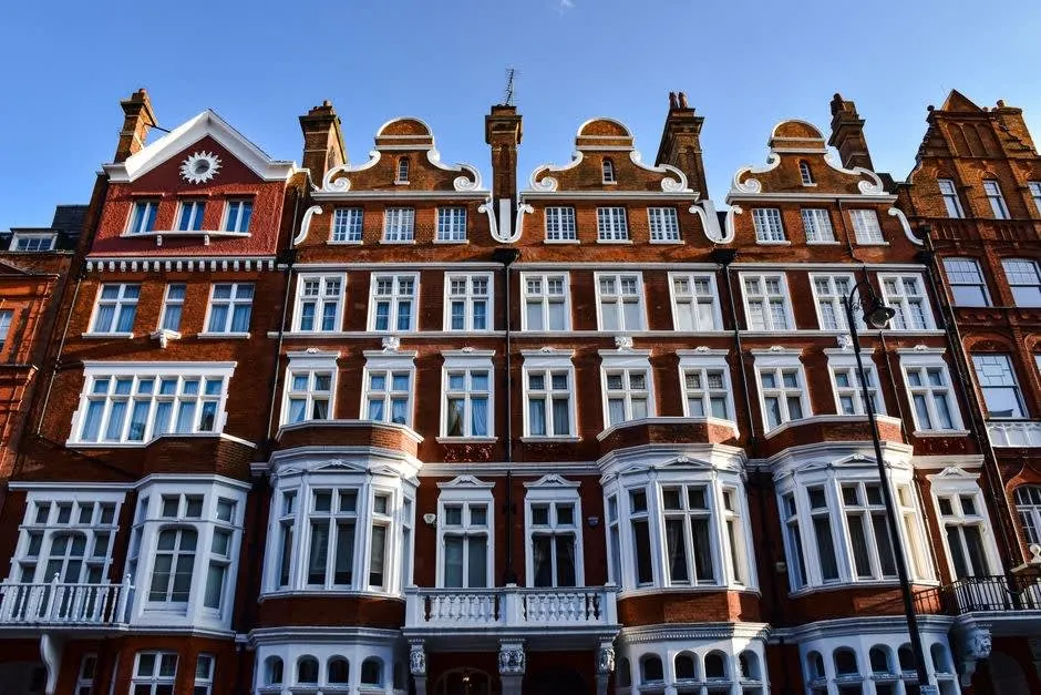 Large Victorian brick villa with ornate windows, of the type converted into leasehold flats in Harrogate