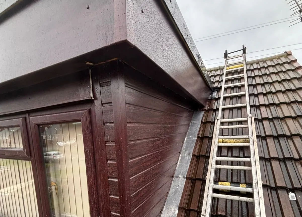 A tiled roof and guttering on a residential home in Harrogate