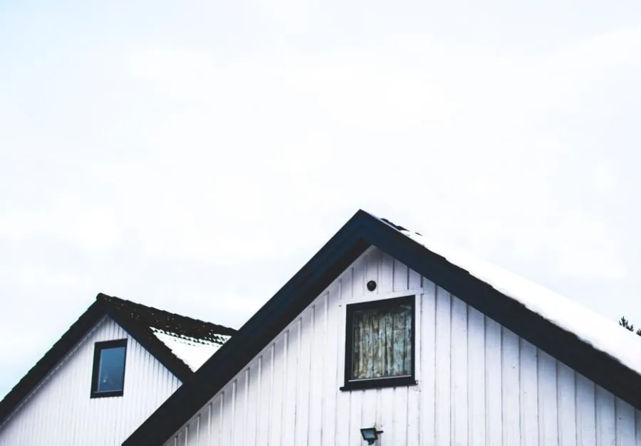 Soffit vents fitted along the eaves of a house for roof ventilation