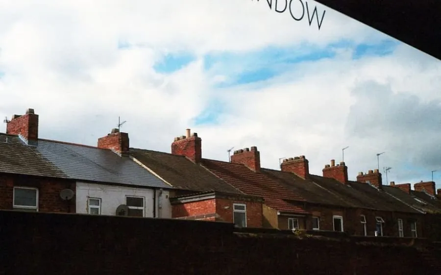 The continuous roof and shared chimneys running along a Harrogate terrace
